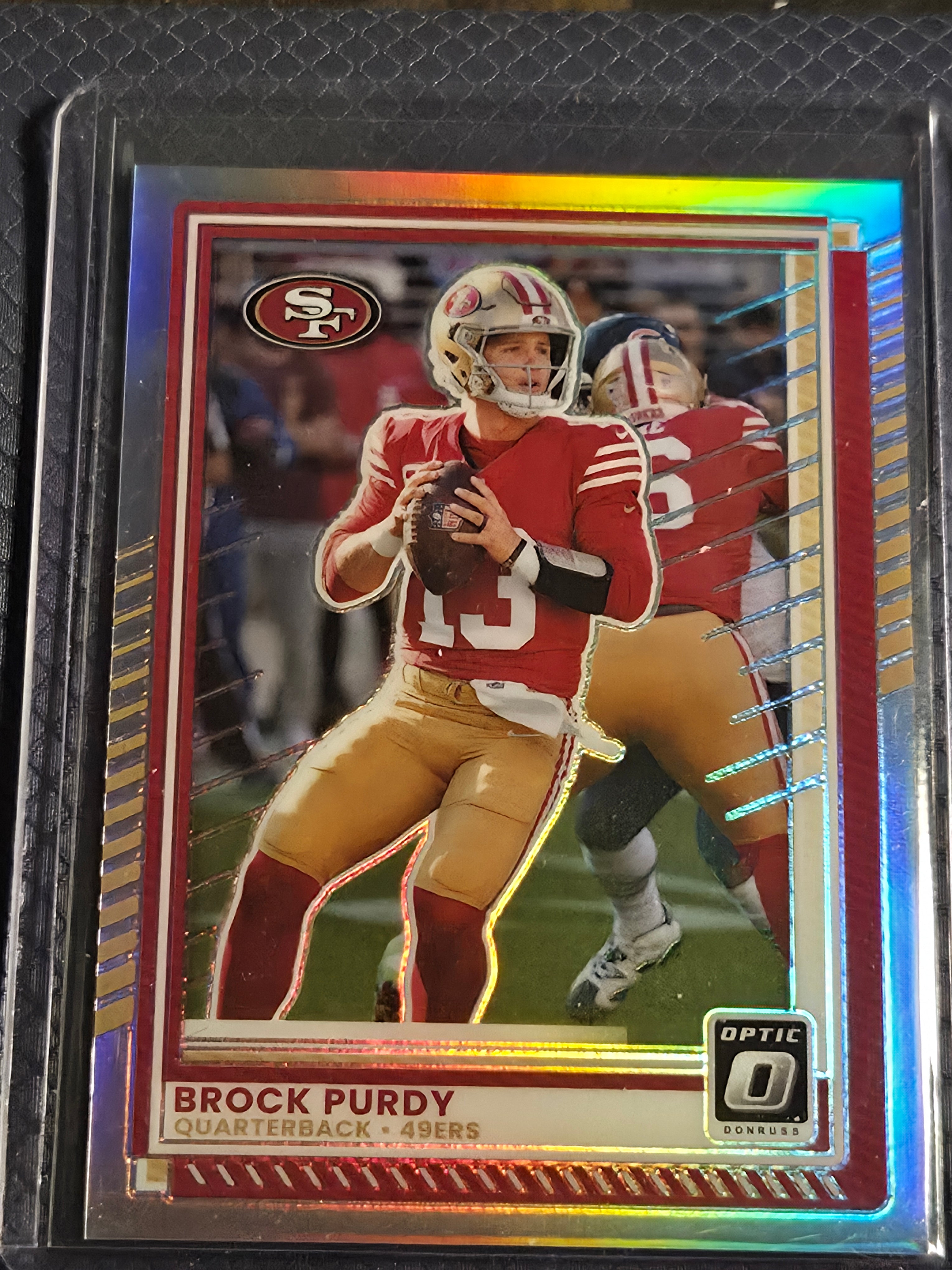 2025 Panini Optic Brock Purdy #38 Holo Silver